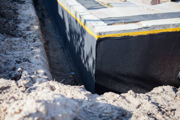 Professional Basement Waterproofing technician working in Middlesex, NC